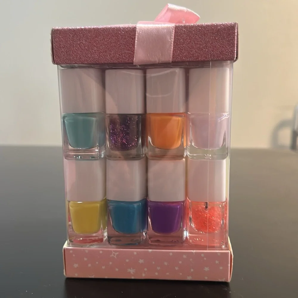Nail Blinger ultimate nail wand and set of 14 Nail colors